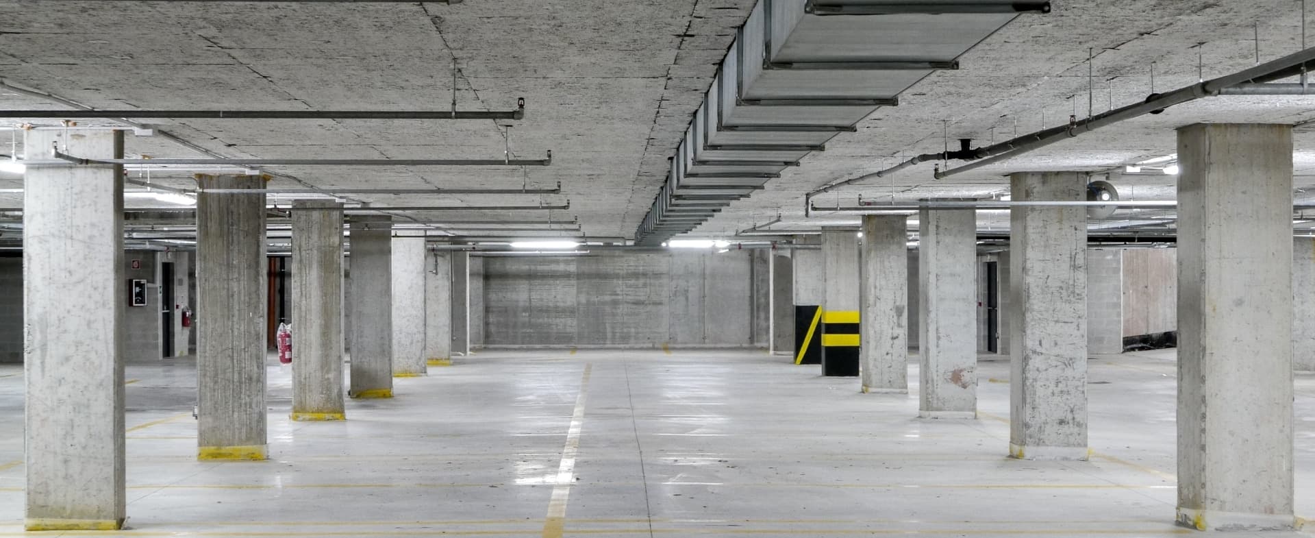 Application de flocage de protection incendie par Millenium Construction